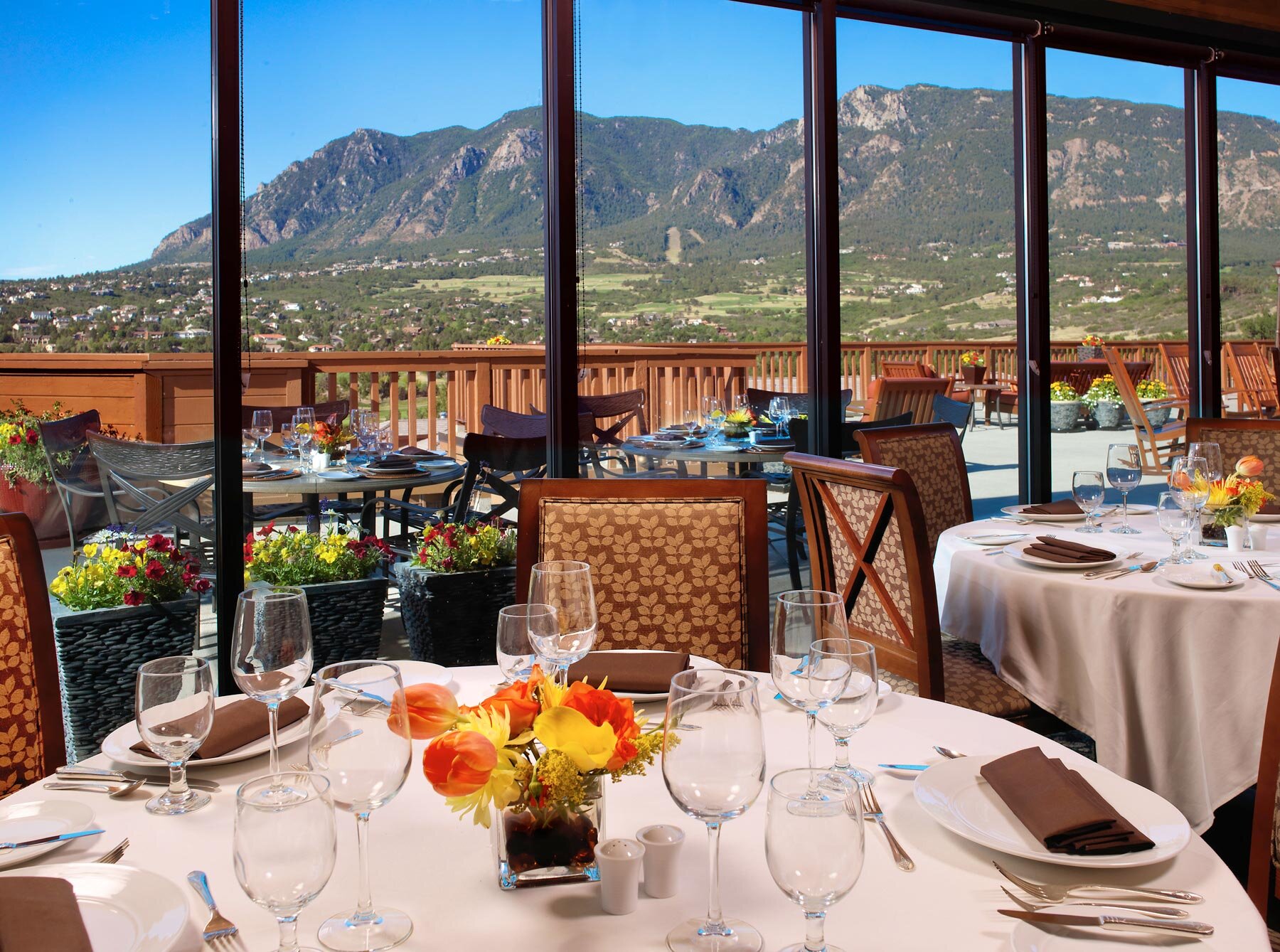 Restaurant looking out to large green mountain